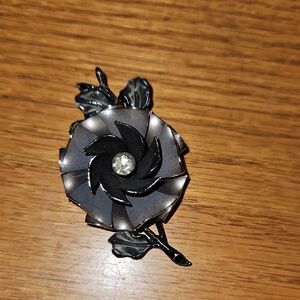Elegant Black and Silver Floral Brooch